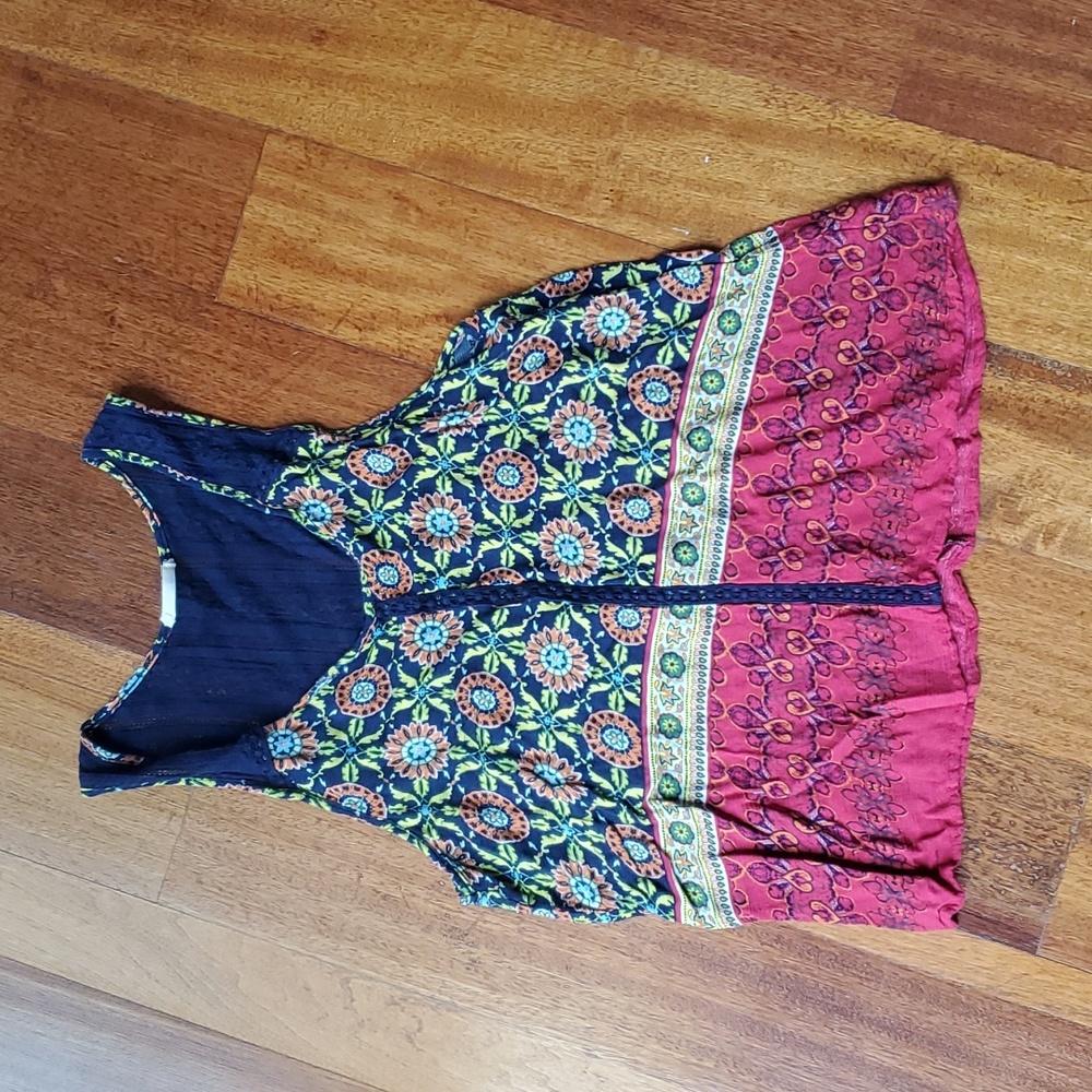 Lacy sleeveless top.